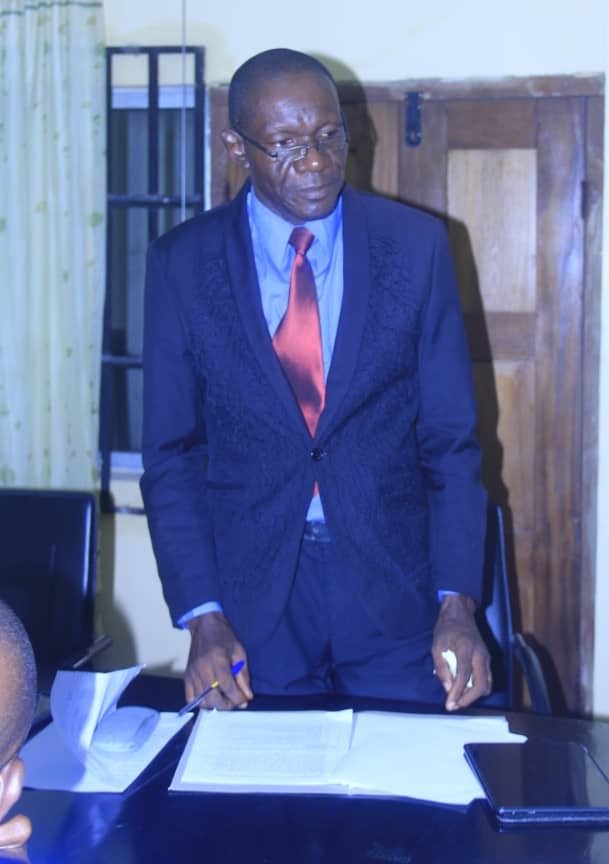 A Council member makes a contribution during deliberations